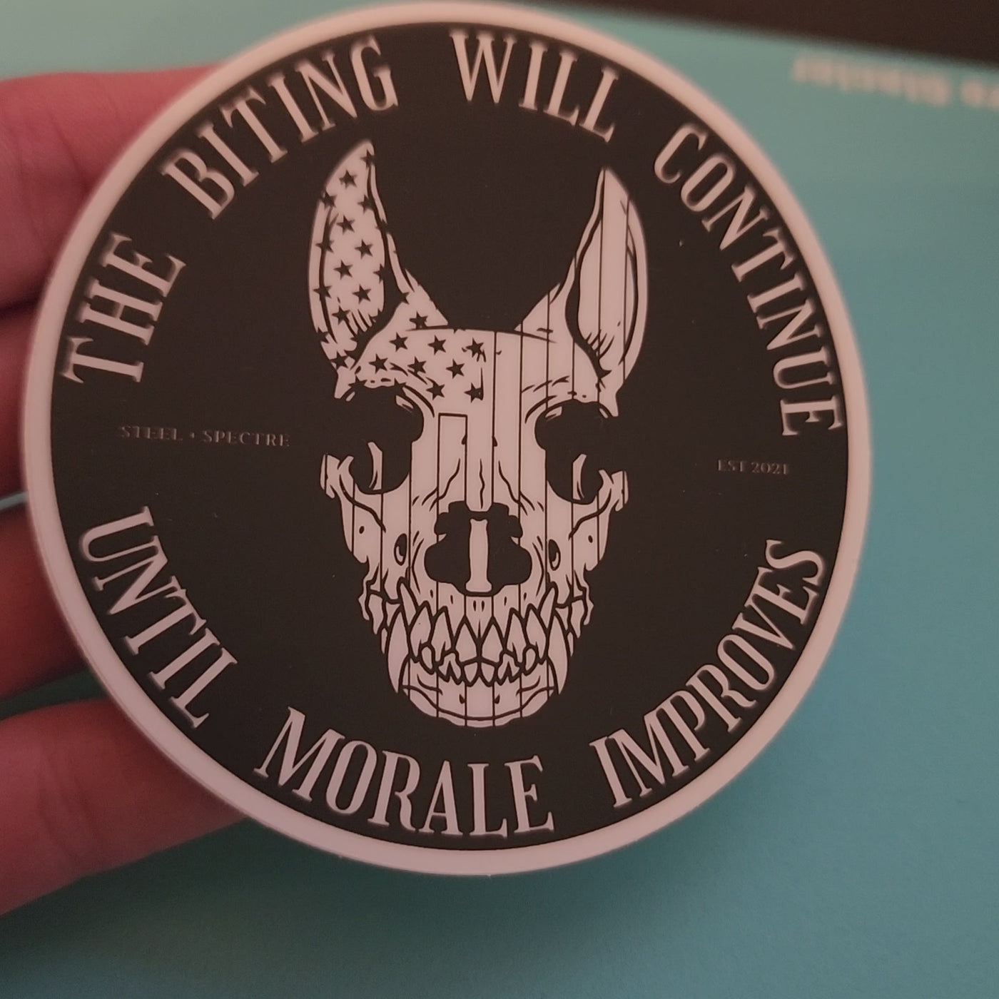 The Biting Will Continue Until Morale Improves Round Sticker